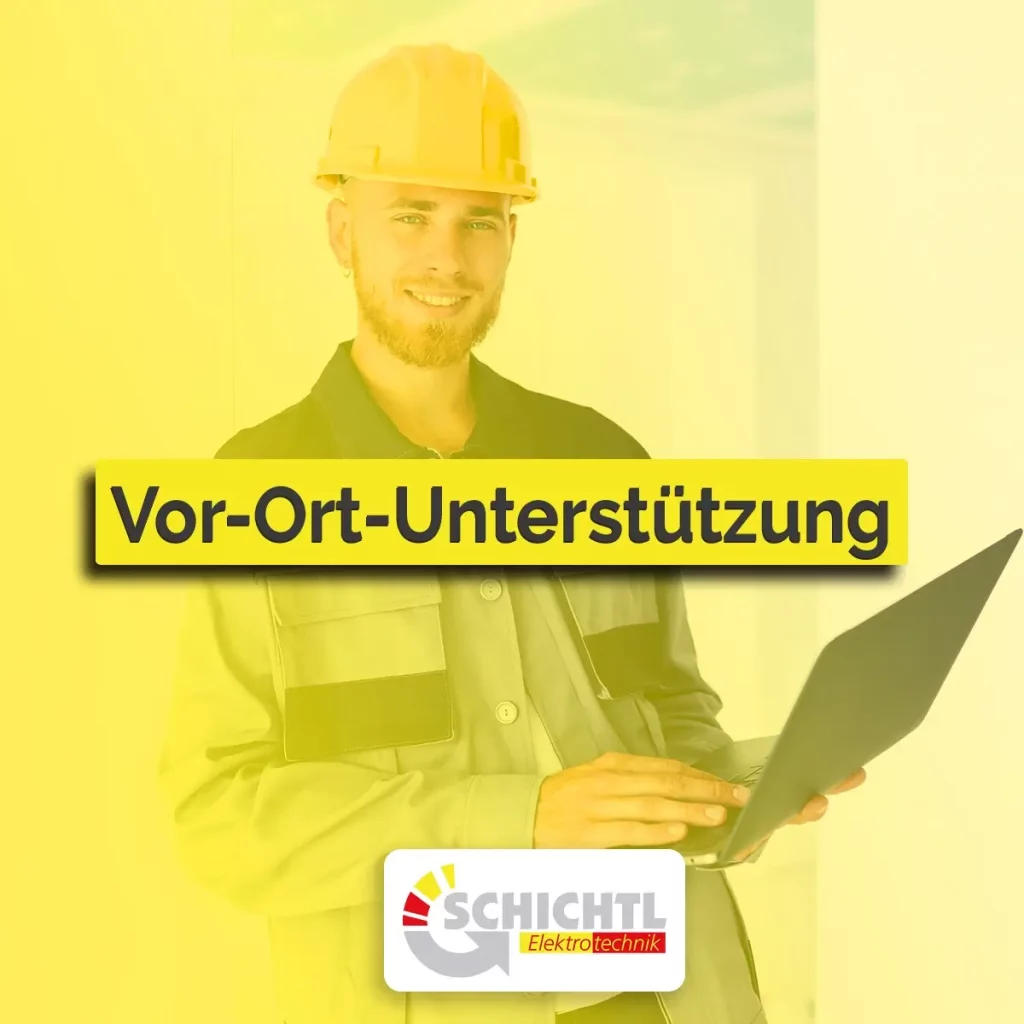 Vor-Ort-Unterstützung: Elektriker mit Schutzhelm und Tablet